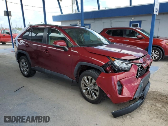 2021 Toyota RAV4 XLE Premium with VIN 2T3C1RFV2MW164644, listed as a Copart auction lot 65607935 with 19,667 mi miles and Salvage title. Bid and sale history available at DreamBid. Image 4.
