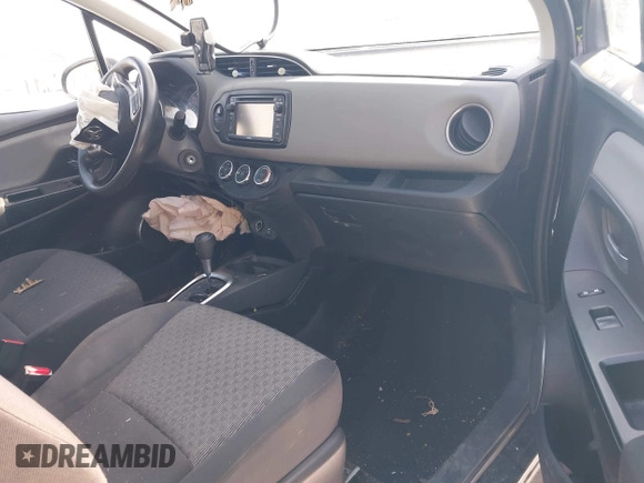 2015 Toyota Yaris L with VIN VNKJTUD34FA055116, listed as a IAAI auction lot 41601874 with 84,508 mi miles. Bid and sale history available at carsss.com. Image 5.