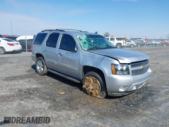 2013 Chevrolet Tahoe LT z VIN 1GNSCBE06DR106384, wystawiony jako IAAI lot #41574274 z przebiegiem 168 655 mil mil oraz . Historia ofert i sprzedaży dostępna na DreamBid. Obrazek 1.