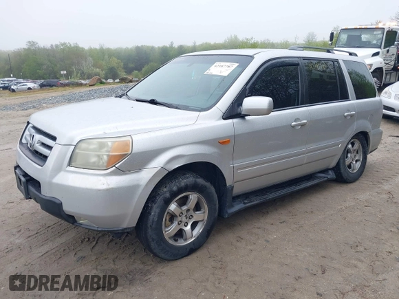 2006 Honda Pilot EX-L with VIN 2HKYF18606H513308, listed as a IAAI auction lot 42187787 with 185,716 mi miles and . Bid and sale history available at DreamBid. Image 2.