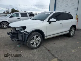 2013 Volkswagen Touareg Sport с VIN WVGEP9BP7DD006632, выставлен на аукционе Copart как лот 82330044 с пробегом 160 219 миль миль и Списание • Salvage title. История ставок и продаж доступна на DreamBid. Изображение 1.