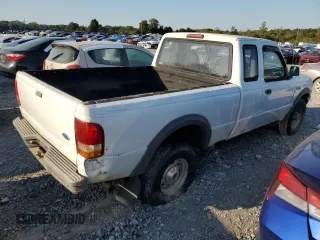 1997 Ford Ranger XL with VIN 1FTCR15U3VPA39507, listed as a Copart auction lot 74720434 with 156,144 mi miles and Salvage title. Bid and sale history available at DreamBid. Image 3.