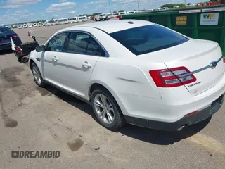 2015 Ford Taurus SEL z VIN 1FAHP2E82FG105766, wystawiony jako IAAI lot #42327700 z przebiegiem 187 185 mil mil oraz . Historia ofert i sprzedaży dostępna na DreamBid. Obrazek 3.