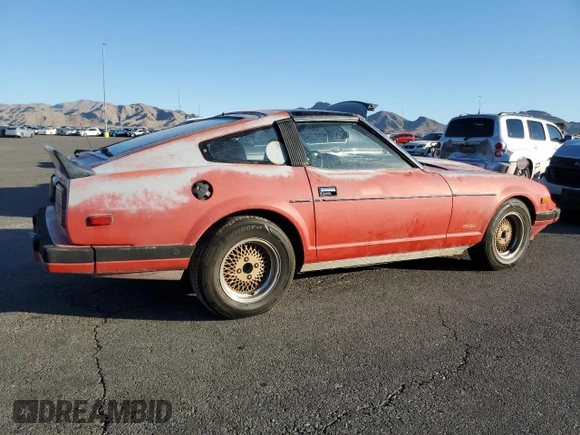 1983 Datsun 280ZX z VIN JN1HZ04S0DX569855, wystawiony jako Copart lot #74027594 z przebiegiem 12 300 mil mil oraz Szkody całkowita. Historia ofert i sprzedaży dostępna na DreamBid. Obrazek 3.