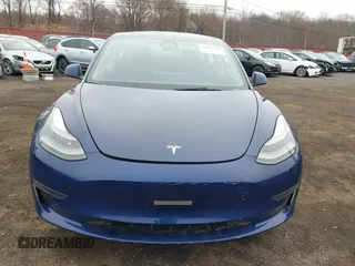 2023 Tesla Model 3 with VIN 5YJ3E1EA1PF664311, listed as a IAAI auction lot 41839591 with 17,416 mi miles and . Bid and sale history available at carsss.com. Image 12.