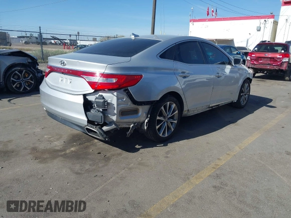 2015 Hyundai Azera z VIN KMHFG4JG0FA453994, wystawiony jako IAAI lot #42002922 z przebiegiem 102 094 mil mil oraz . Historia ofert i sprzedaży dostępna na DreamBid. Obrazek 4.