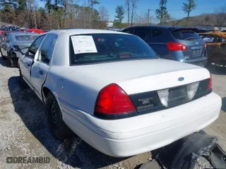 2007 Ford Police Interceptor with VIN 2FAFP71W47X103554, listed as a IAAI auction lot 41565806 with 148,429 mi miles. Bid and sale history available at carsss.com. Image 3.