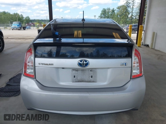 2015 Toyota Prius Four z VIN JTDKN3DU8F0427475, wystawiony jako IAAI lot #42338538 z przebiegiem 295 283 mil mil oraz . Historia ofert i sprzedaży dostępna na DreamBid. Obrazek 16.