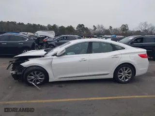 2014 Hyundai Azera Limited with VIN KMHFH4JG7EA365603, listed as a IAAI auction lot 41297919 with 83,690 mi miles. Bid and sale history available at carsss.com. Image 15.