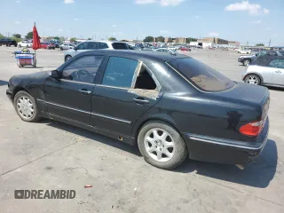 2001 Mercedes-Benz E-Class with VIN WDBJF65J01B225871, listed as a Copart auction lot 66136994 with 2,139,454 mi miles and Clean Title. Bid and sale history available at carsss.com. Image 2.