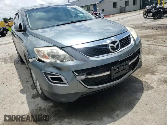 2012 Mazda CX-9 Grand Touring z VIN JM3TB2DA9C0350650, wystawiony jako Copart lot #60733775 z przebiegiem 246 128 mil mil oraz Szkoda całkowita • Salvage title. Historia ofert i sprzedaży dostępna na DreamBid. Obrazek 14.