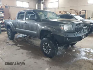 2009 Toyota Tacoma z VIN 5TEMU52N99Z668548, wystawiony jako IAAI lot #41507218 z przebiegiem 153 565 mil mil oraz . Historia ofert i sprzedaży dostępna na DreamBid. Obrazek 1.