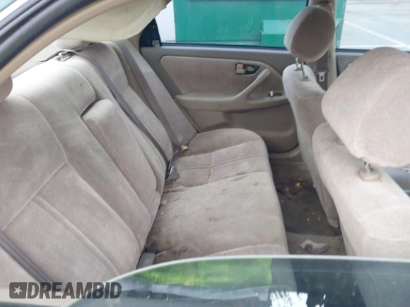 1998 Toyota Camry LE z VIN 4T1BG22K0WU372241, wystawiony jako IAAI lot #42215308 z przebiegiem 136 942 mil mil oraz . Historia ofert i sprzedaży dostępna na DreamBid. Obrazek 8.