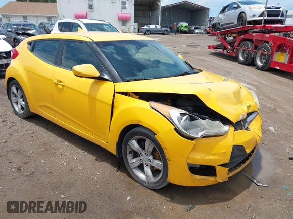 2012 Hyundai Veloster w/Black Int with VIN KMHTC6AD5CU046702, listed as a IAAI auction lot 42245379 with 136,327 mi miles and . Bid and sale history available at DreamBid. Image 1.