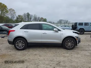 2017 Cadillac XT5 Luxury FWD z VIN 1GYKNBRS2HZ232241, wystawiony jako IAAI lot #41875766 z przebiegiem 195 113 mil mil oraz . Historia ofert i sprzedaży dostępna na DreamBid. Obrazek 14.