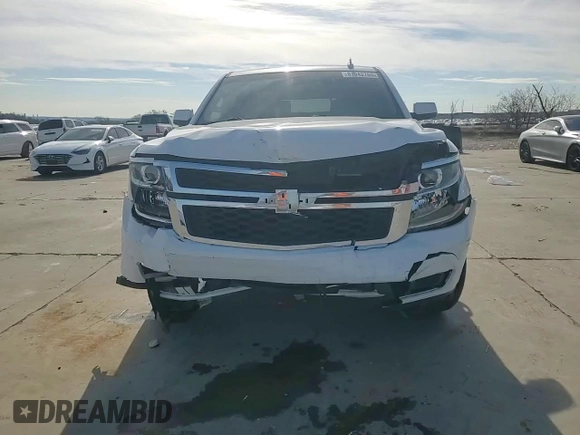 2016 Chevrolet Tahoe Commercial z VIN 1GNLCDEC9GR252678, wystawiony jako Copart lot #87942765 z przebiegiem 163 560 mil mil oraz Szkoda całkowita • Salvage title. Historia ofert i sprzedaży dostępna na DreamBid. Obrazek 14.