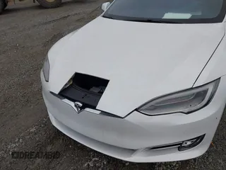 2020 Tesla Model S Long Range with VIN 5YJSA1E27LF370700, listed as a IAAI auction lot 41703463 with 26,024 mi miles and . Bid and sale history available at carsss.com. Image 17.
