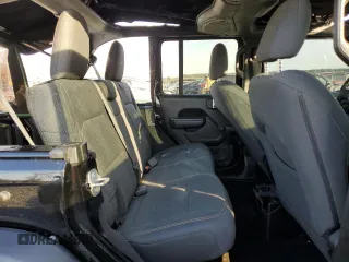 2024 Jeep Wrangler Sport S with VIN 1C4PJXDG1RW277777, listed as a Copart auction lot 49437045 with 10,405 mi miles and Salvage title. Bid and sale history available at DreamBid. Image 11.