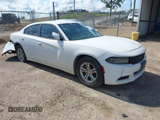2015 Dodge Charger SE z VIN 2C3CDXBGXFH741074, wystawiony jako IAAI lot #42338118 z przebiegiem 259 062 mil mil oraz . Historia ofert i sprzedaży dostępna na DreamBid. Obrazek 1.