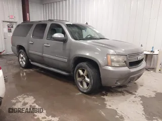 2007 Chevrolet Suburban LTZ with VIN 1GNFK16397J255558, listed as a IAAI auction lot 41804073 with 176,503 mi miles and . Bid and sale history available at DreamBid. Image 1.