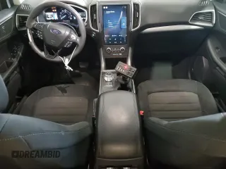 2021 Ford Edge SE с VIN 2FMPK3G91MBA23317, выставлен на аукционе Copart как лот 49802305 с пробегом 67 220 миль миль и Чистый • Clean title. История ставок и продаж доступна на DreamBid. Изображение 8.