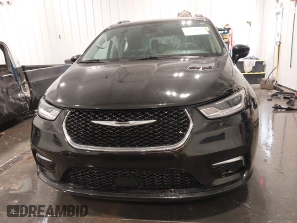 2022 Chrysler Pacifica Touring L with VIN 2C4RC1BG0NR170029, listed as a IAAI auction lot 41890660 with 88,121 mi miles and . Bid and sale history available at DreamBid. Image 12.