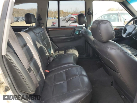 1997 Jeep Grand Cherokee Limited with VIN 1J4GZ78Y0VC727386, listed as a Copart auction lot 78673094 with 199,729 mi miles and Clean Title. Bid and sale history available at carsss.com. Image 11.