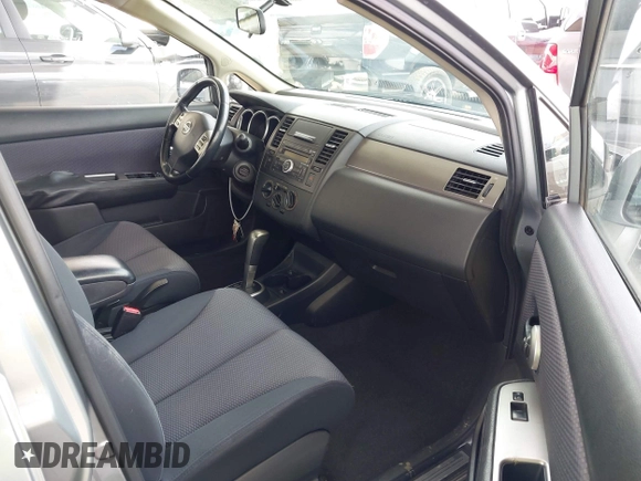 2009 Nissan Versa 1.8 S with VIN 3N1BC13E39L391774, listed as a IAAI auction lot 41925859 with 132,019 mi miles. Bid and sale history available at carsss.com. Image 5.