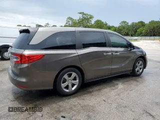 2018 Honda Odyssey EX with VIN 5FNRL6H5XJB017330, listed as a Copart auction lot 63470395 with 121,827 mi miles and Salvage title. Bid and sale history available at DreamBid. Image 3.