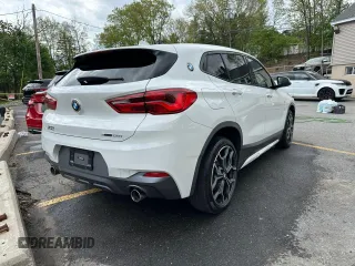 2018 BMW X2 sDrive28i z VIN WBXYJ3C32JEJ75882, wystawiony jako Copart lot #56330835 z przebiegiem 84 609 mil mil oraz Tytuł czysty. Historia ofert i sprzedaży dostępna na DreamBid. Obrazek 3.