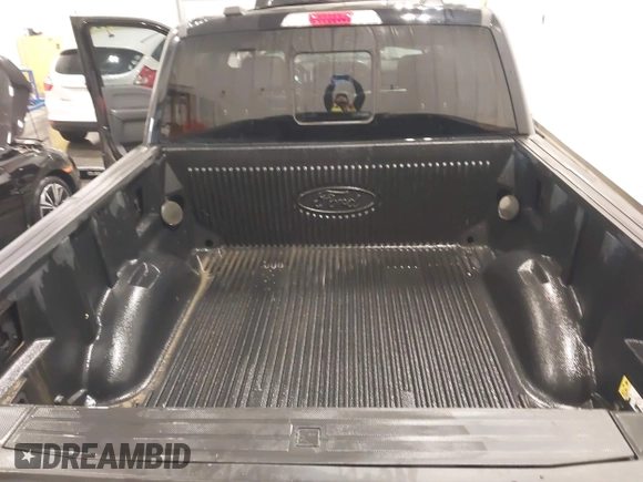 2021 Ford F-150 XL with VIN 1FTFW1E82MFB57285, listed as a IAAI auction lot 42073523 with 51,030 mi miles and . Bid and sale history available at DreamBid. Image 12.