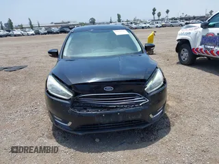 2016 Ford Focus Titanium z VIN 1FADP3J20GL310467, wystawiony jako IAAI lot #42478332 z przebiegiem 214 479 mil mil oraz . Historia ofert i sprzedaży dostępna na DreamBid. Obrazek 12.
