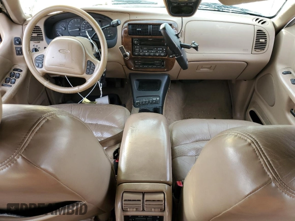 1999 Ford Explorer XLT z VIN 1FMZU35P1XZA10234, wystawiony jako Copart lot #45131435 z przebiegiem 180 247 mil mil oraz Szkoda całkowita • Salvage title. Historia ofert i sprzedaży dostępna na DreamBid. Obrazek 8.