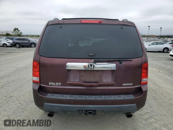 2011 Honda Pilot Touring z VIN 5FNYF3H92BB039165, wystawiony jako Copart lot #59596105 z przebiegiem 182 944 mil mil oraz Szkoda całkowita • Salvage title. Historia ofert i sprzedaży dostępna na DreamBid. Obrazek 6.