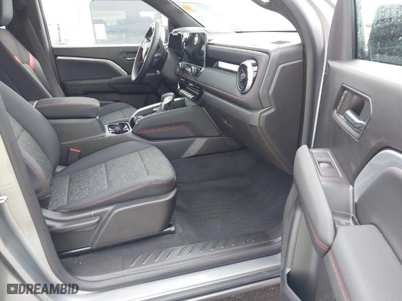 2023 Chevrolet Colorado 4WD Z71 with VIN 1GCPTDEK6P1137701, listed as a IAAI auction lot 40774940 with 10,818 mi miles. Bid and sale history available at carsss.com. Image 5.