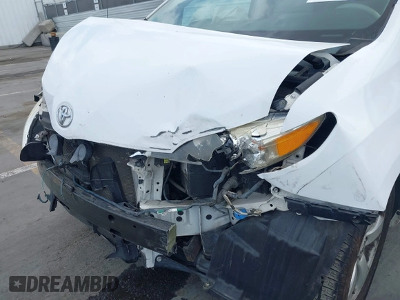 2013 Toyota Sienna LE AAS with VIN 5TDKK3DC2DS302465, listed as a IAAI auction lot 42241744 with 149,937 mi miles and . Bid and sale history available at DreamBid. Image 6.