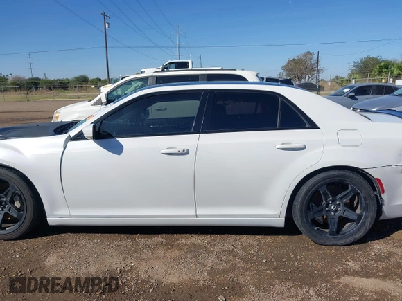 2012 Chrysler 300 SRT-8 with VIN 2C3CCAFJ9CH801749, listed as a IAAI auction lot 40912606 with 144,404 mi miles and . Bid and sale history available at DreamBid. Image 15.
