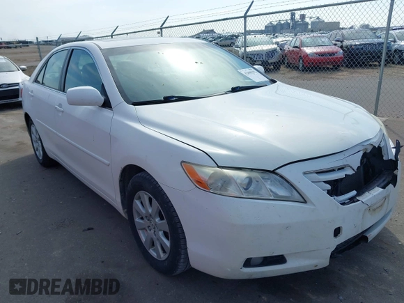 2007 Toyota Camry LE with VIN JTNBK46K973018732, listed as a IAAI auction lot 42000392 with 263,788 mi miles and . Bid and sale history available at DreamBid. Image 1.