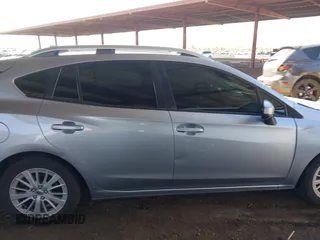 2017 Subaru Impreza Premium z VIN 4S3GTAB69H3703779, wystawiony jako IAAI lot #42151284 z przebiegiem 135 455 mil mil oraz . Historia ofert i sprzedaży dostępna na DreamBid. Obrazek 13.