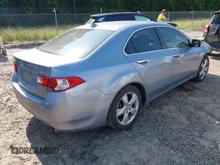 2009 Acura TSX z VIN JH4CU26639C018916, wystawiony jako IAAI lot #42301010 z przebiegiem 152 249 mil mil oraz . Historia ofert i sprzedaży dostępna na DreamBid. Obrazek 4.