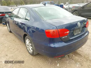 2013 Volkswagen Jetta Sedan SE w/Convenience/Sunroof with VIN 3VWBP7AJ3DM357905, listed as a IAAI auction lot 42065633 with 124,015 mi miles. Bid and sale history available at carsss.com. Image 3.