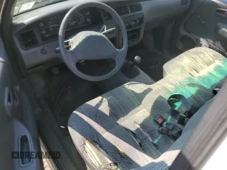 1993 Toyota T100 DX z VIN JT4VD10A5P0010588, wystawiony jako Copart lot #63862014 z przebiegiem 295 012 mil mil oraz Czysty tytuł • Clean title. Historia ofert i sprzedaży dostępna na DreamBid. Obrazek 8.
