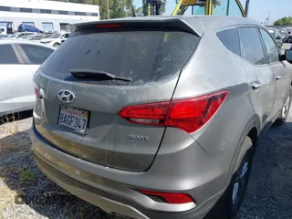 2018 Hyundai Santa Fe 2.4L with VIN 5NMZT3LB8JH076788, listed as a IAAI auction lot 42421969 with 49,689 mi miles and . Bid and sale history available at DreamBid. Image 17.