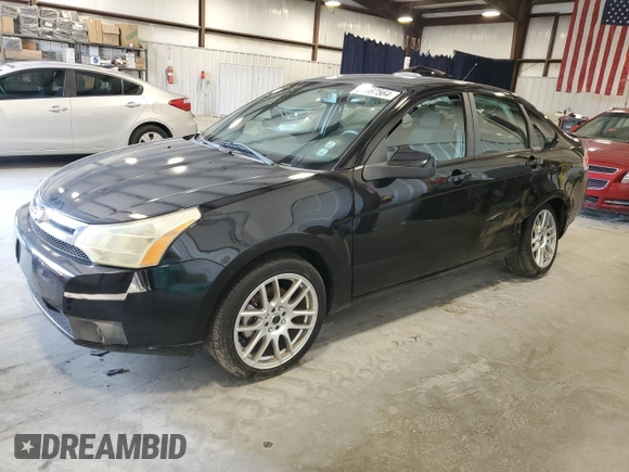 2009 Ford Focus SES with VIN 1FAHP36N49W189173, listed as a Copart auction lot 61967564 with 82,587 mi miles and Salvage Title. Bid and sale history available at carsss.com. Image 1.