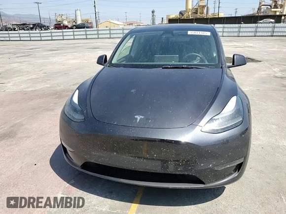 2024 Tesla Model Y Long Range z VIN 7SAYGDEE0RF062395, wystawiony jako Copart lot #55071185 z przebiegiem 42 747 mil mil oraz Szkoda całkowita • Salvage title. Historia ofert i sprzedaży dostępna na DreamBid. Obrazek 14.