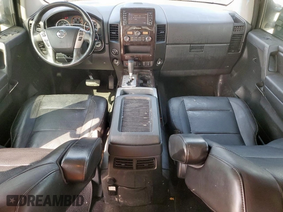 2013 Nissan Titan Pro-4X with VIN 1N6BA0EC3DN310741, listed as a Copart auction lot 57171975 with 146,524 mi miles and Salvage title. Bid and sale history available at DreamBid. Image 8.