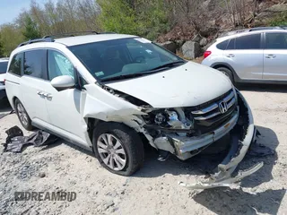 2014 Honda Odyssey EX with VIN 5FNRL5H47EB016885, listed as a IAAI auction lot 42136365 with 100,189 mi miles and . Bid and sale history available at carsss.com. Image 1.
