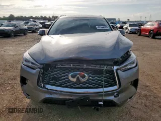 2023 Infiniti QX50 Luxe z VIN 3PCAJ5BA3PF105275, wystawiony jako Copart lot #61144205 z przebiegiem 26 399 mil mil oraz Szkoda całkowita • Salvage title. Historia ofert i sprzedaży dostępna na DreamBid. Obrazek 5.