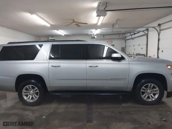 2019 Chevrolet Suburban LT with VIN 1GNSKHKC8KR185851, listed as a IAAI auction lot 41604664 with NaN miles. Bid and sale history available at carsss.com. Image 14.