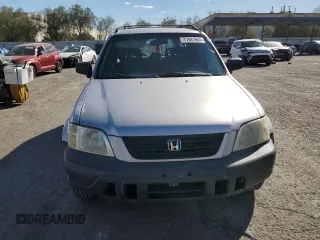 2000 Honda CR-V LX with VIN JHLRD1849YC047923, listed as a Copart auction lot 77041664 with 235,211 mi miles and Salvage Title. Bid and sale history available at carsss.com. Image 5.